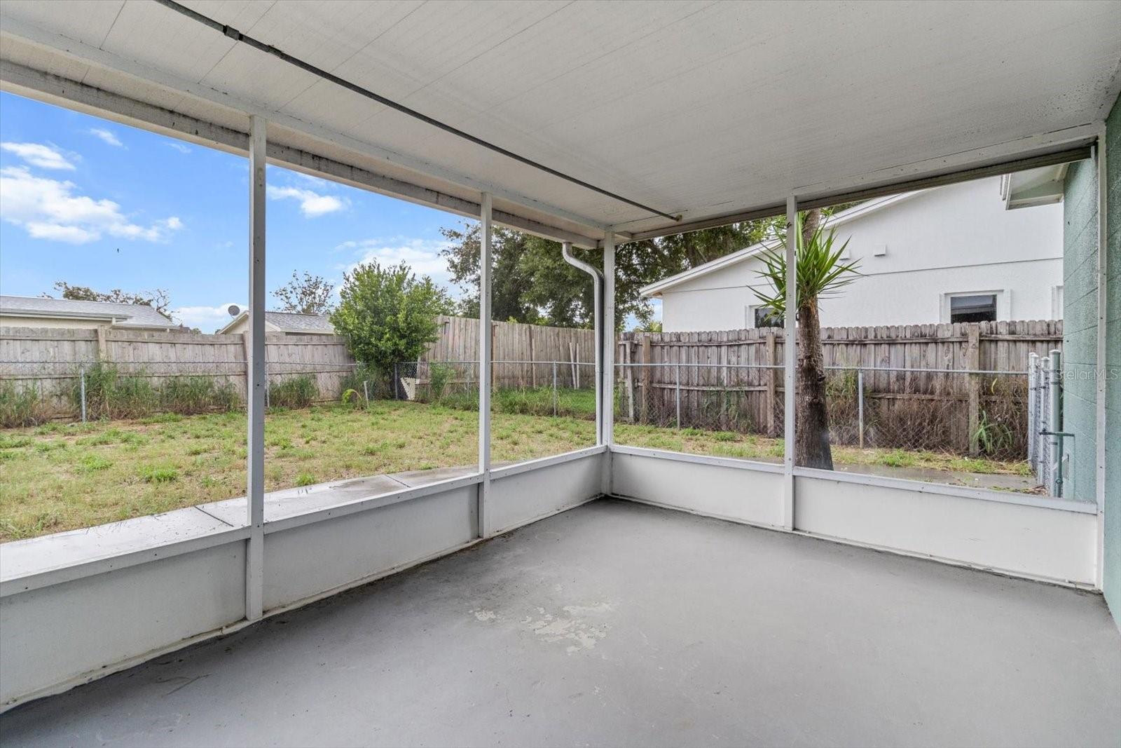 Covered and screened-in porch, ideal for relaxing bug-free evenings.