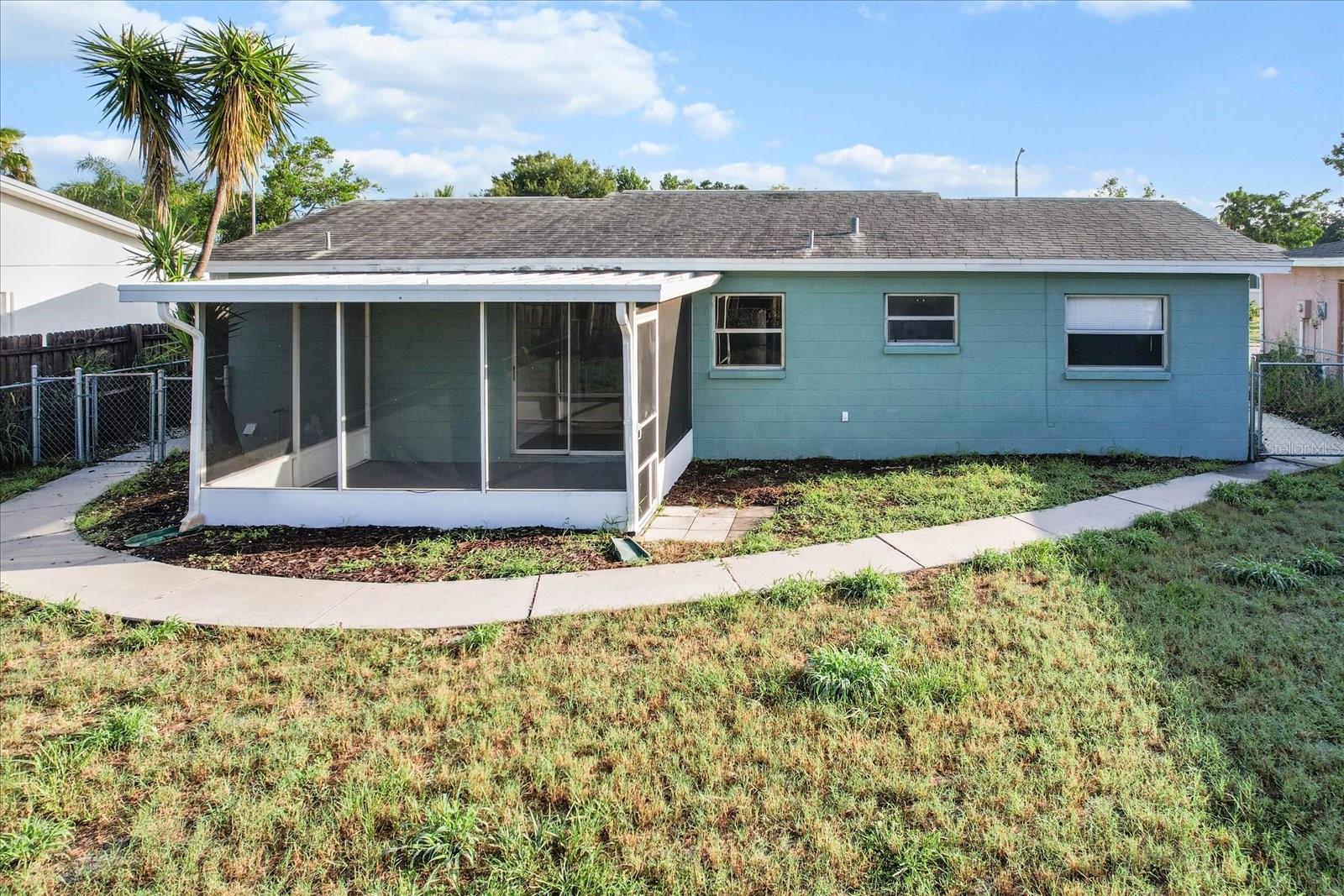 This overhead shot showcases the home’s layout, walkable yard, and well-maintained roof—offering peace of mind and space to enjoy.