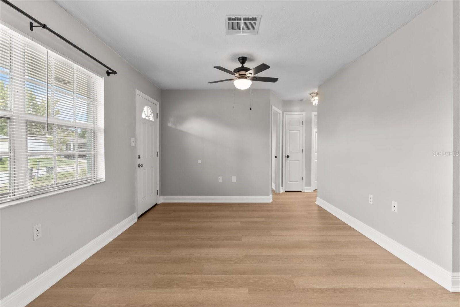 Open layout flows seamlessly into the kitchen and dining space.
