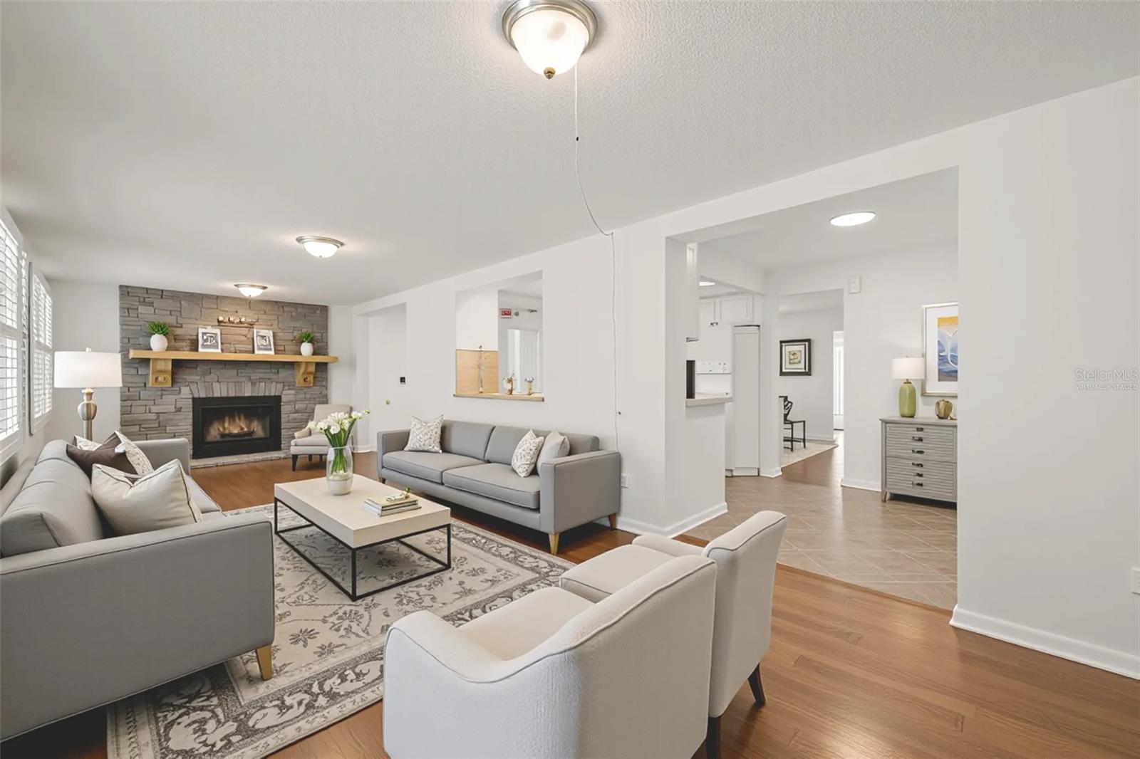 Florida room virtually staged looking into the kitchen