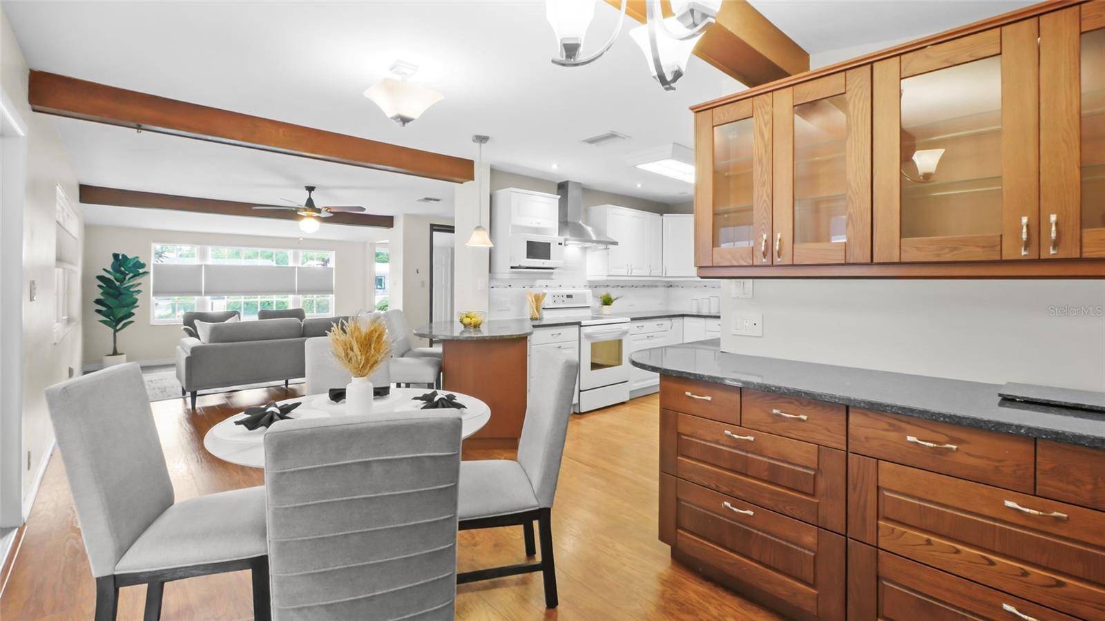 Open concept kitchen, dining and living room