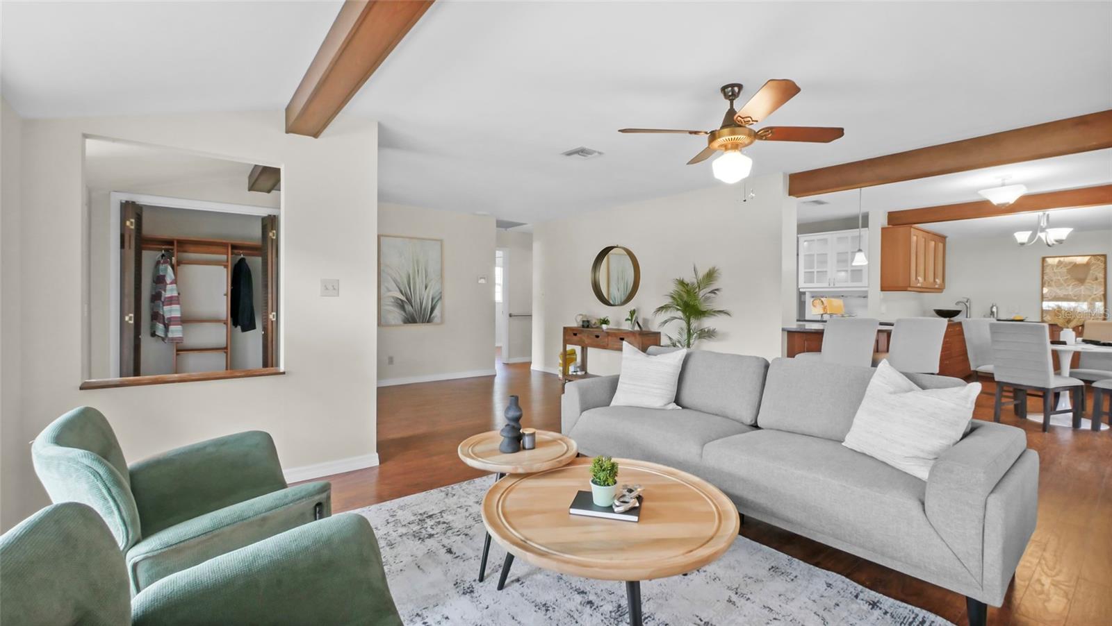 Living room and entryway with a closet - a rare Gulfport find!