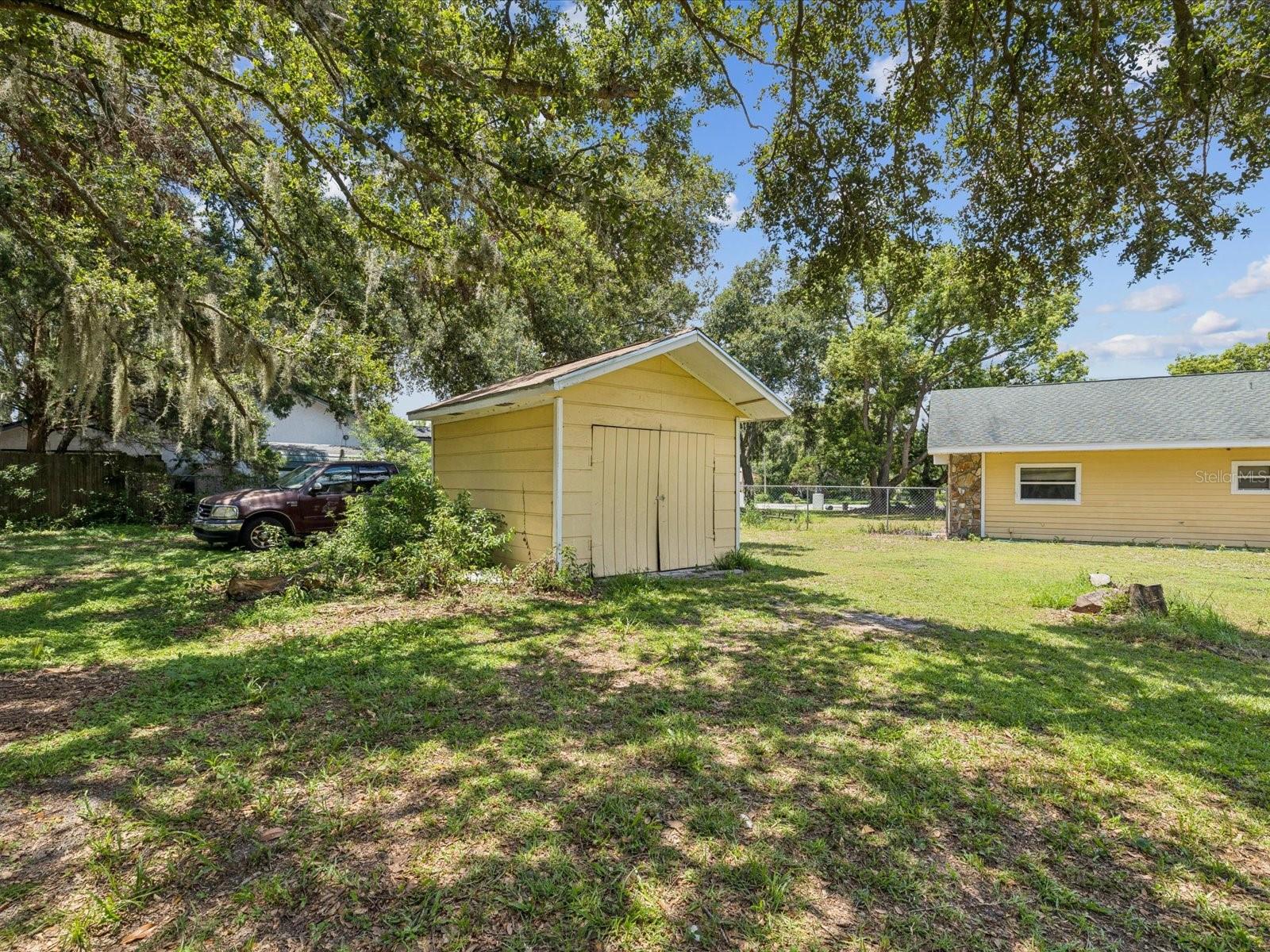 Shed with car hiding, car not included