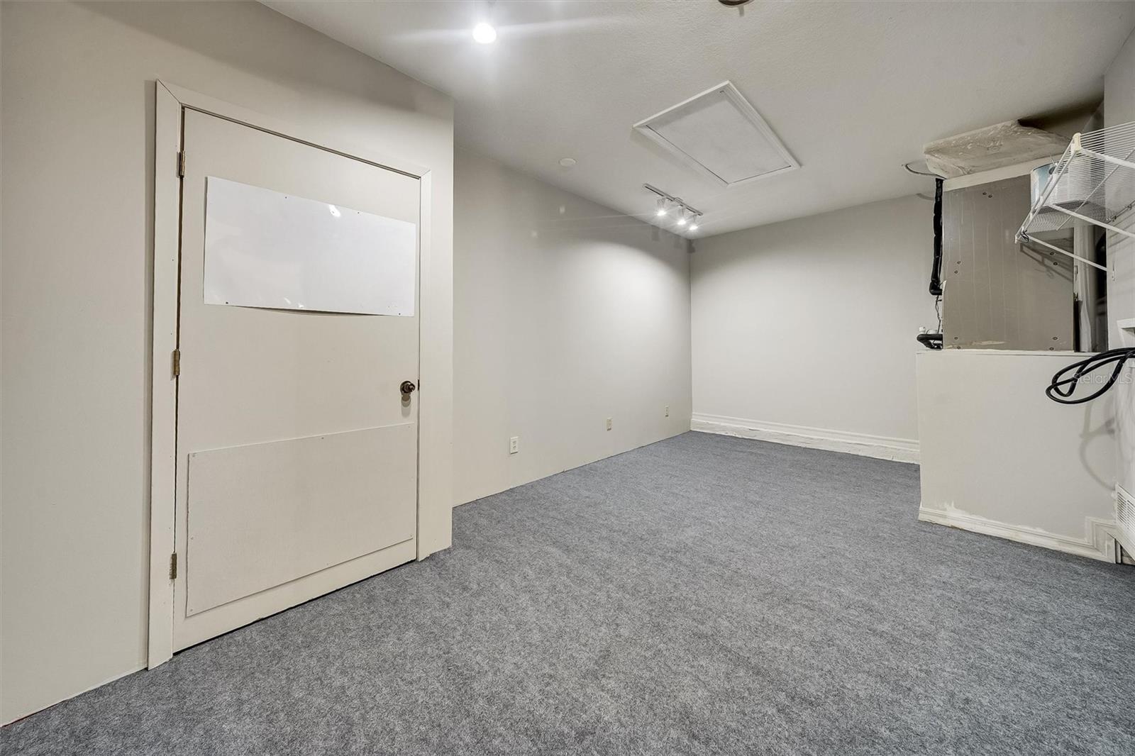 Converted garage (office + laundry or flex + laundry)