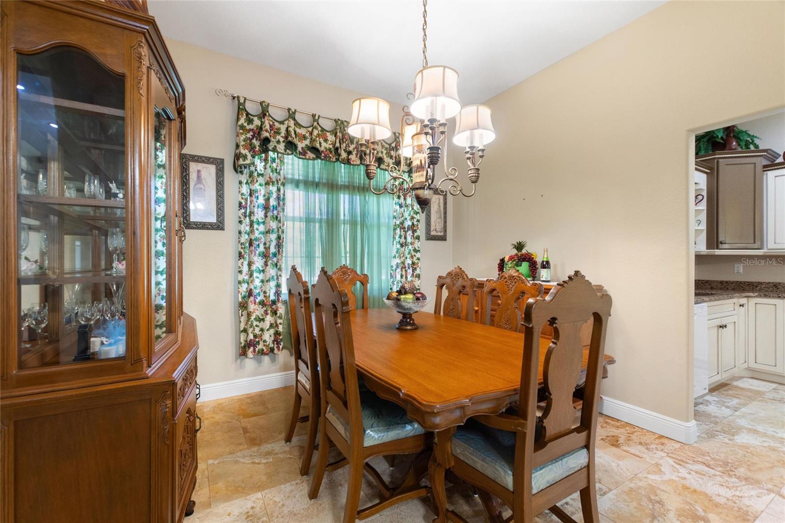 Dining Room features large window with views to the beautiful front yard.