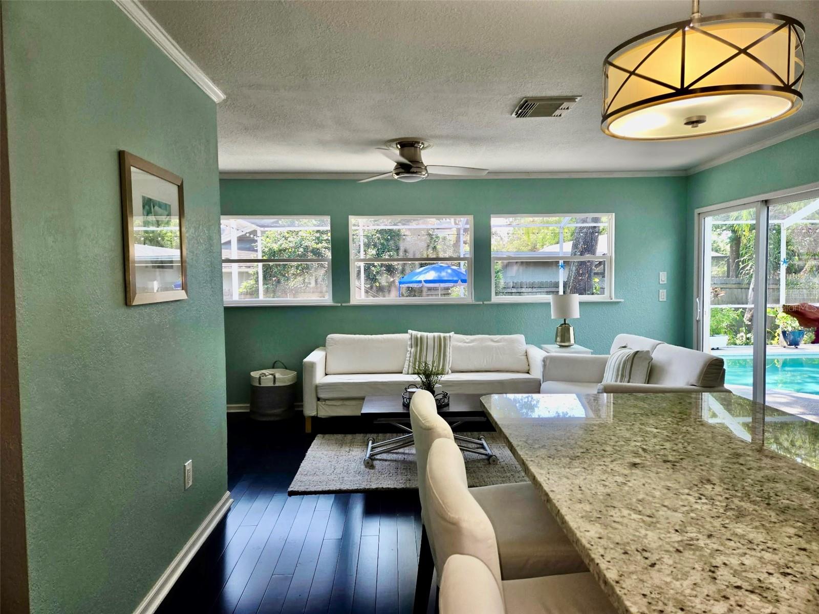 Family attached to kitchen