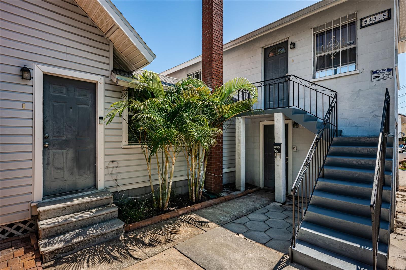 Side Entrance and Stairs to Above Garage 1/1 Apartment