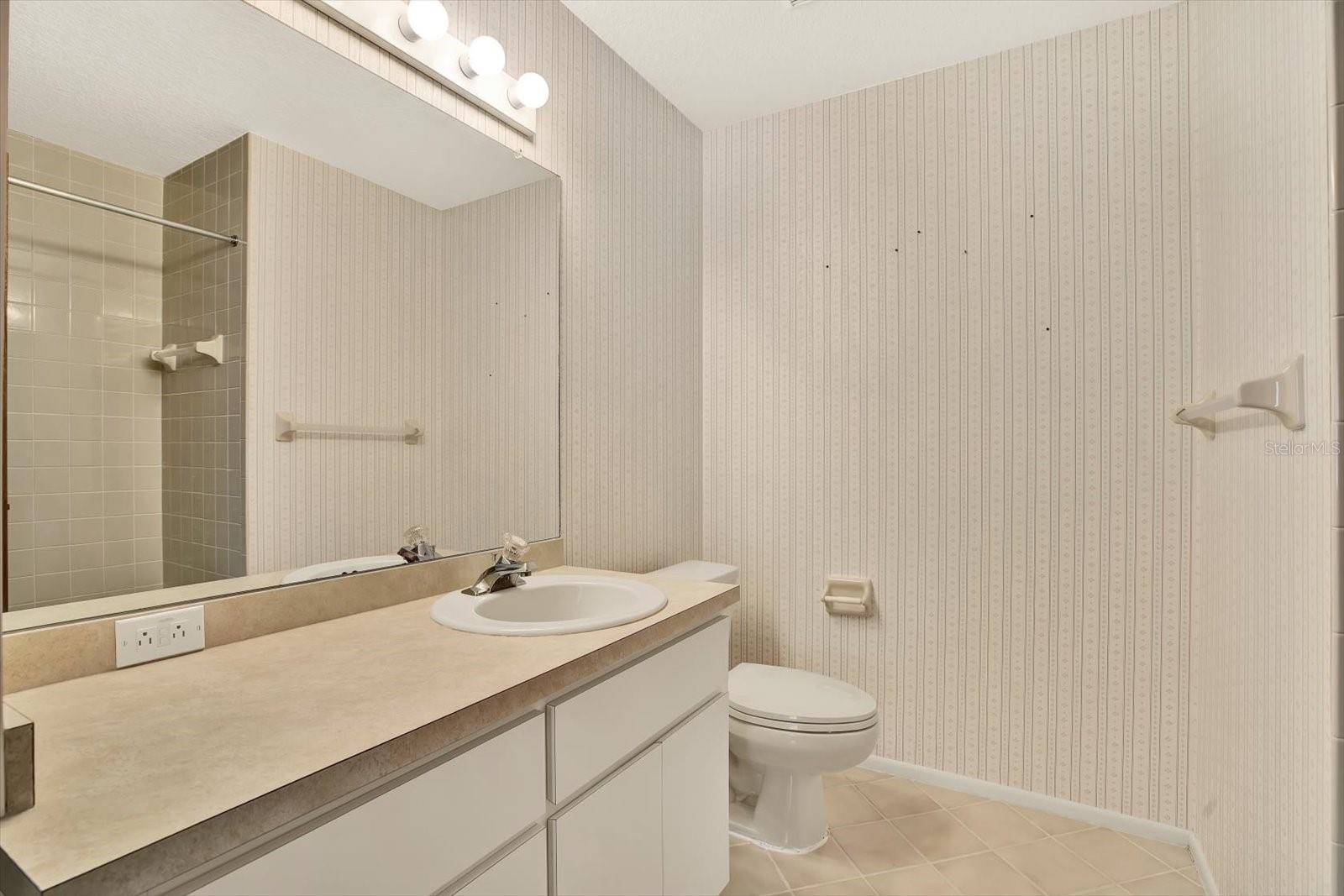 Guest Bath with shower/tub combo.