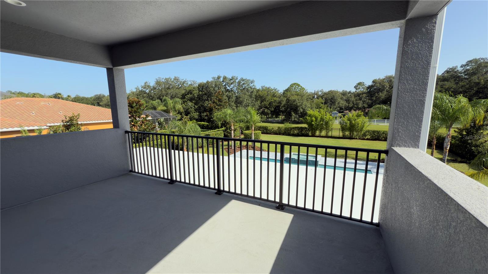 Outside upstairs Balcony view of Backyard