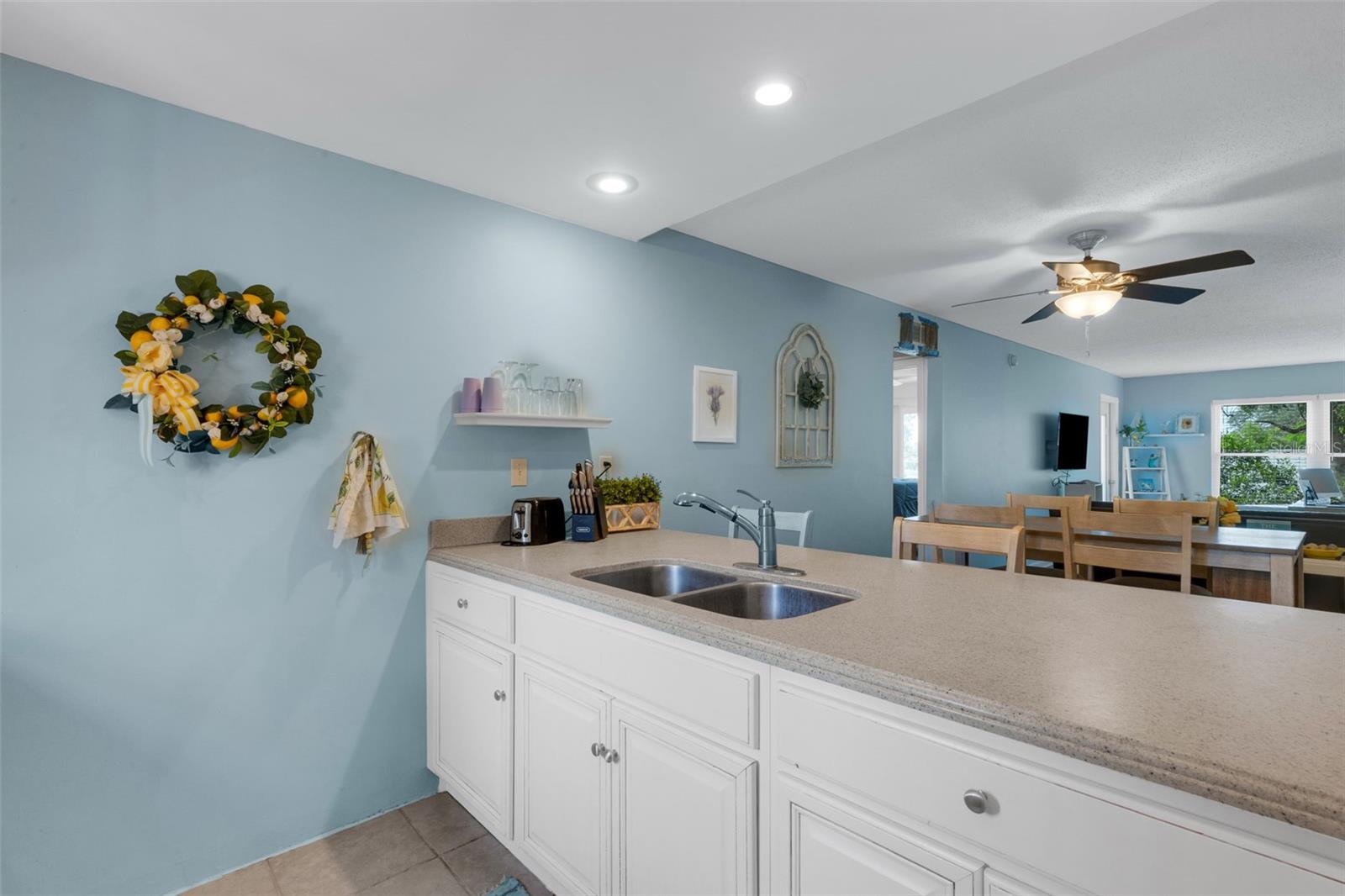 kitchen with living room and dining room view