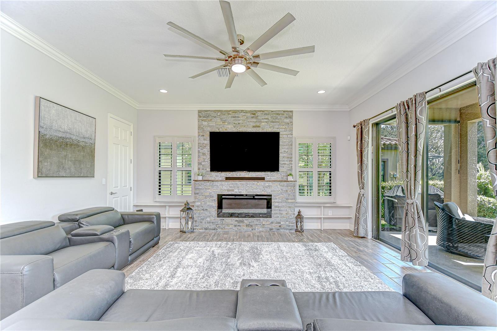 Great room features and electric fireplace and storage closet!