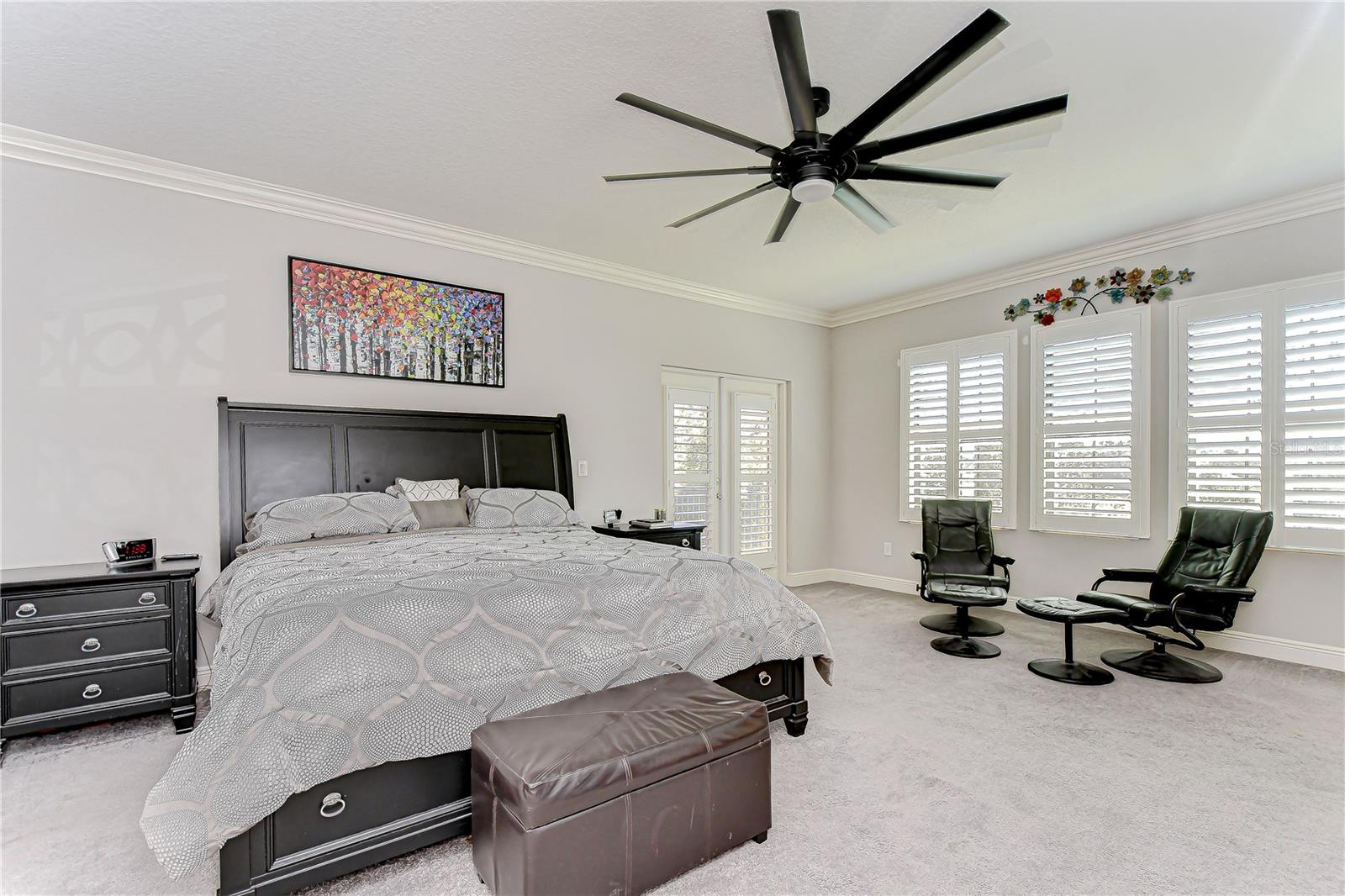 Primary suite with custom plantation shutters!