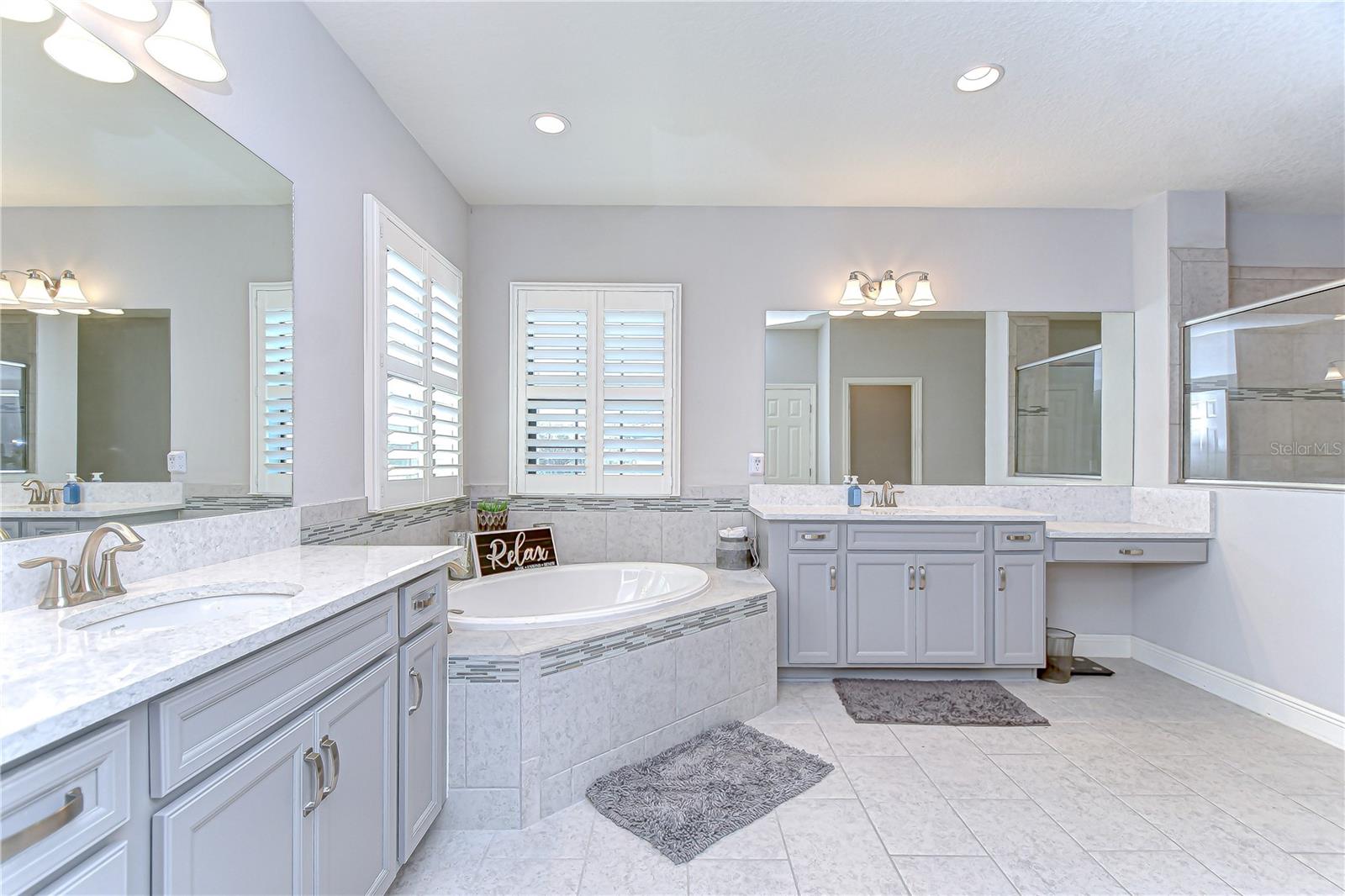 Primary en-suite with seperate vanities!