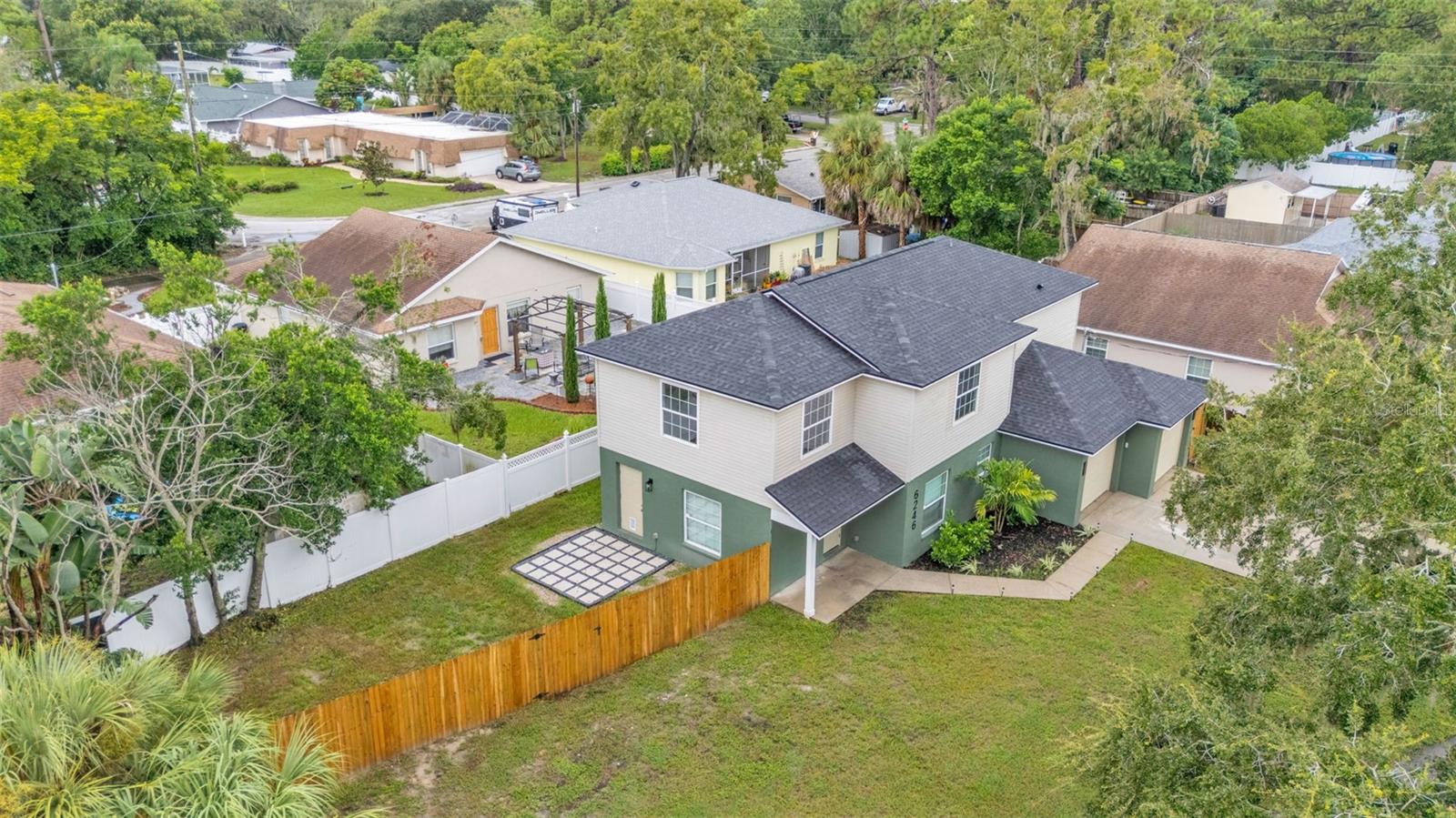 Aerial view of property and surrounding area.