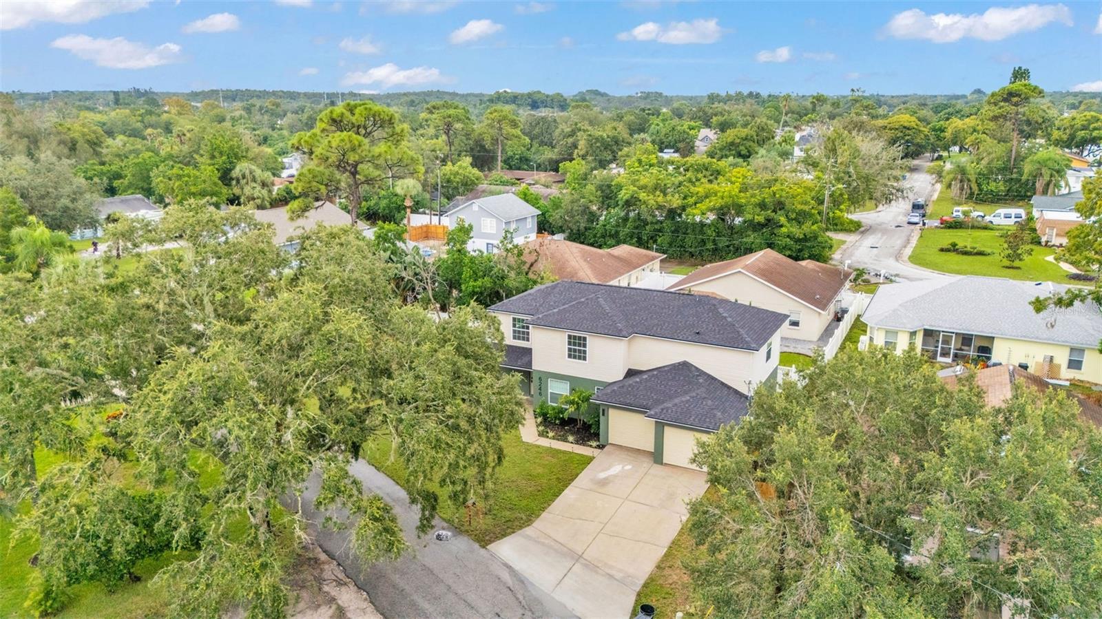 Aerial view of property and surrounding area.