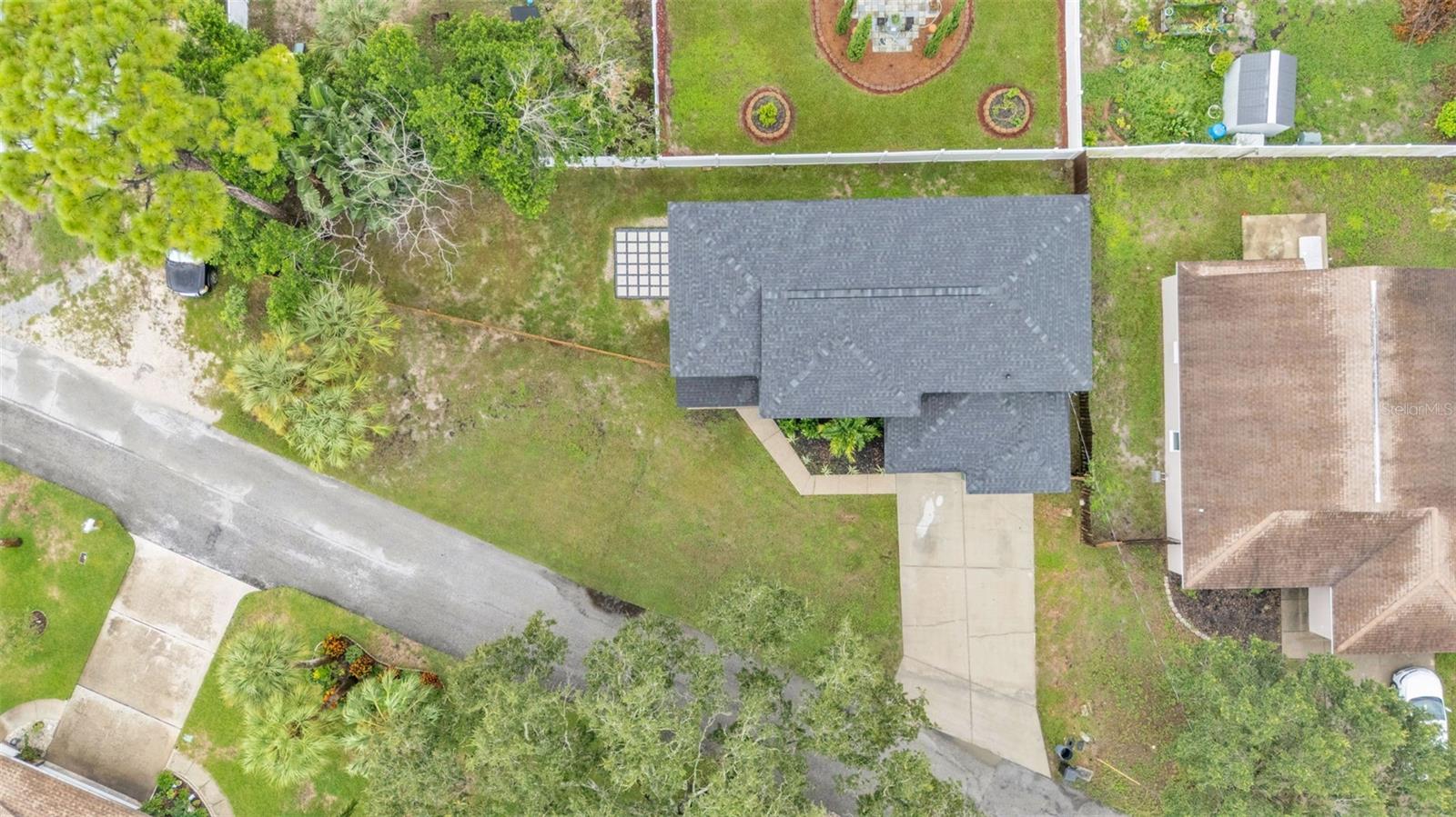 Aerial view of property and surrounding area.