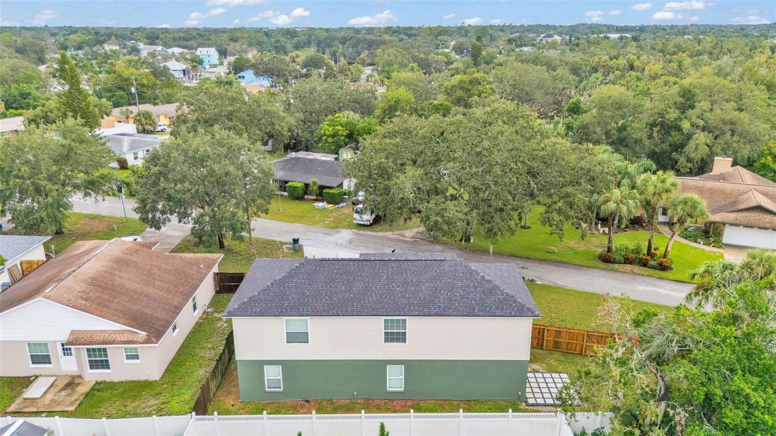 Aerial view of property and surrounding area.