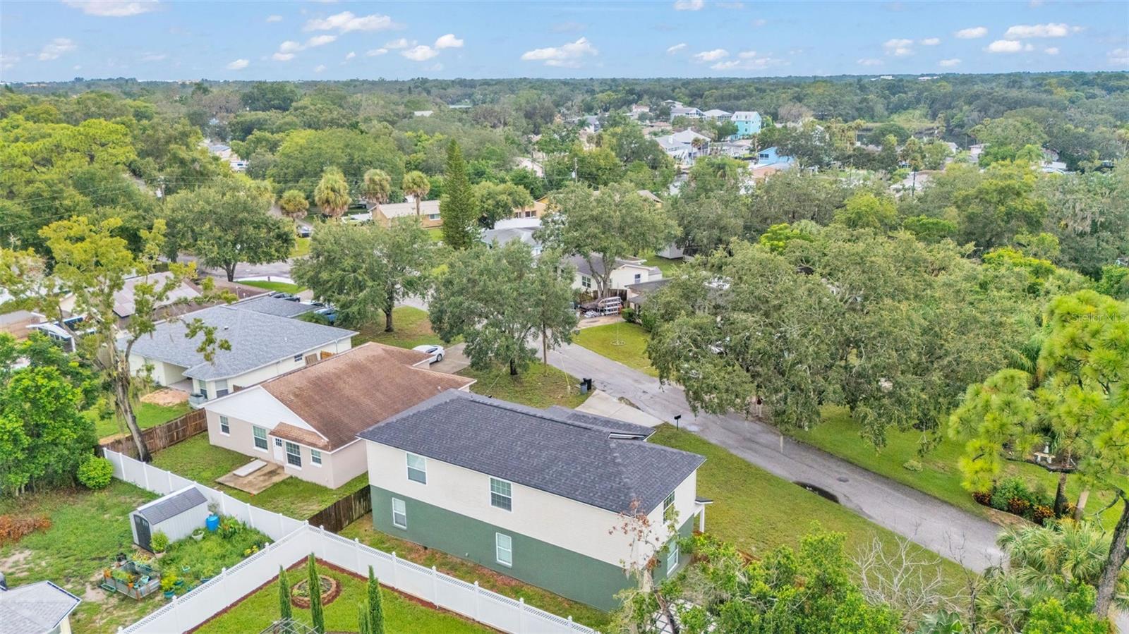 Aerial view of property and surrounding area.