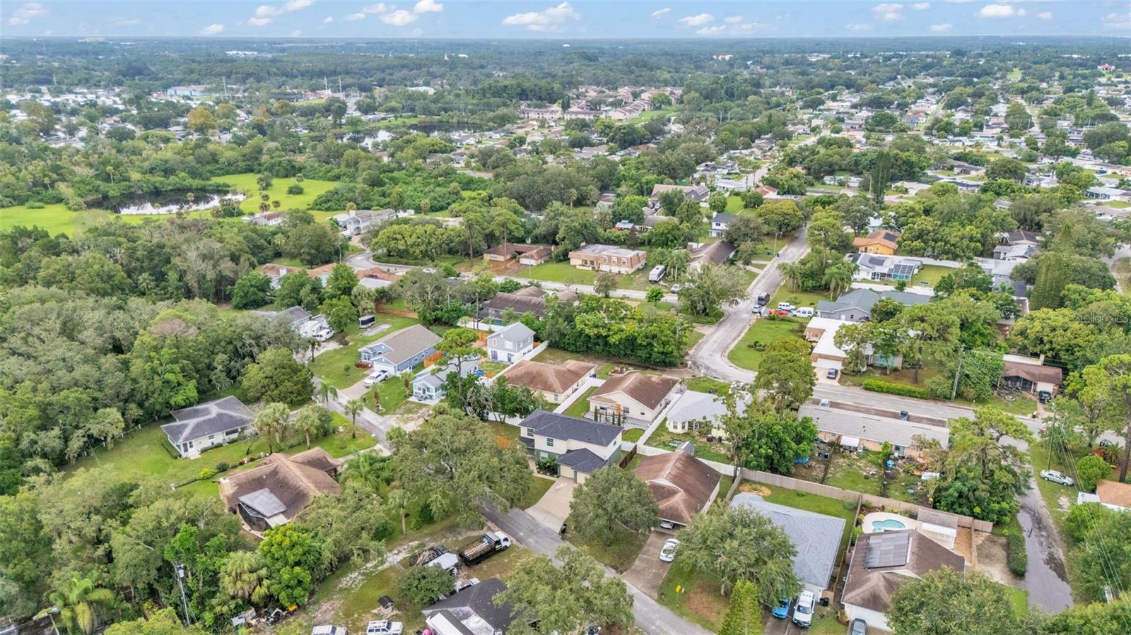 Aerial view of property and surrounding area.