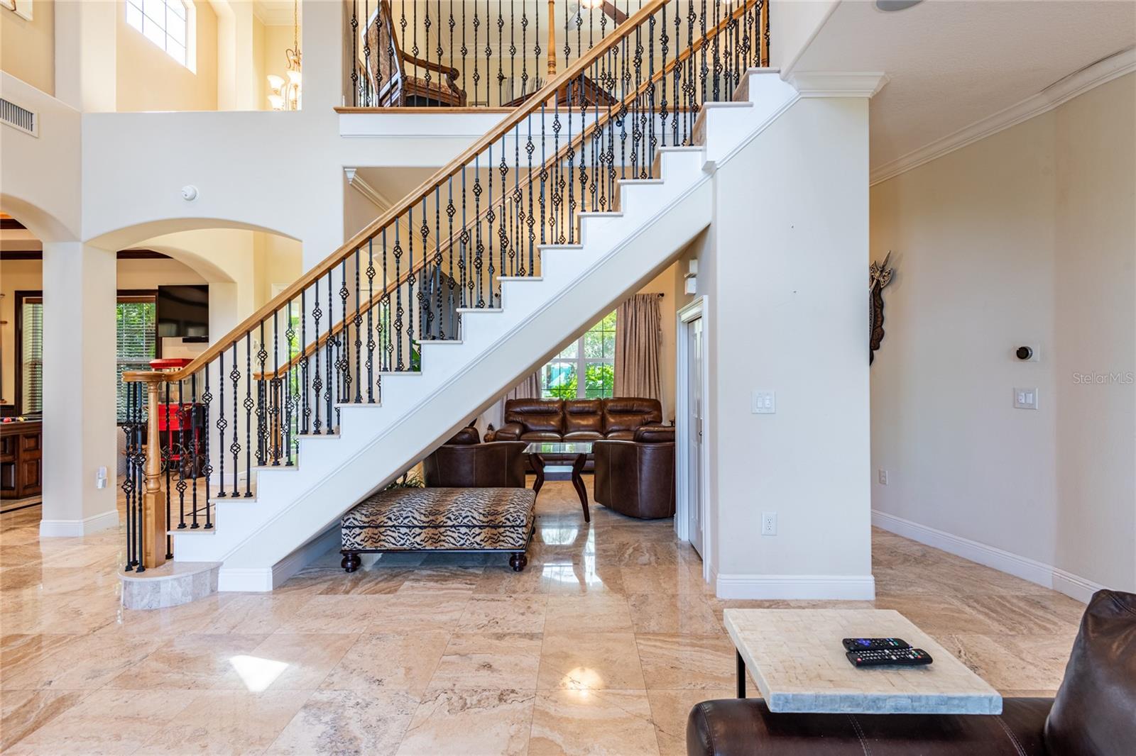 Storage closet under stairs to the right