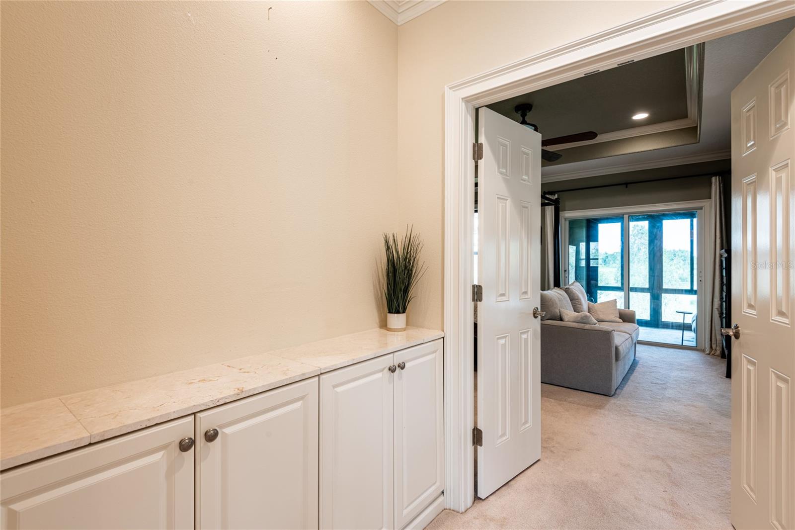 Extra cabinets at top of staircase.