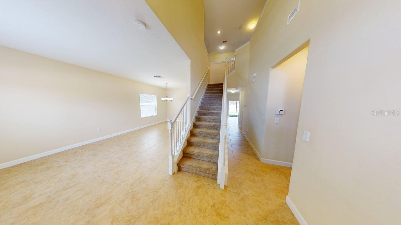 View from the front door living dining combo to the left  and garage to the right