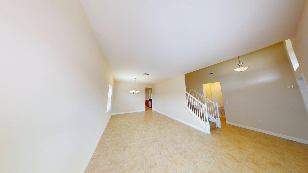 Living room dining room combo from the front of the home