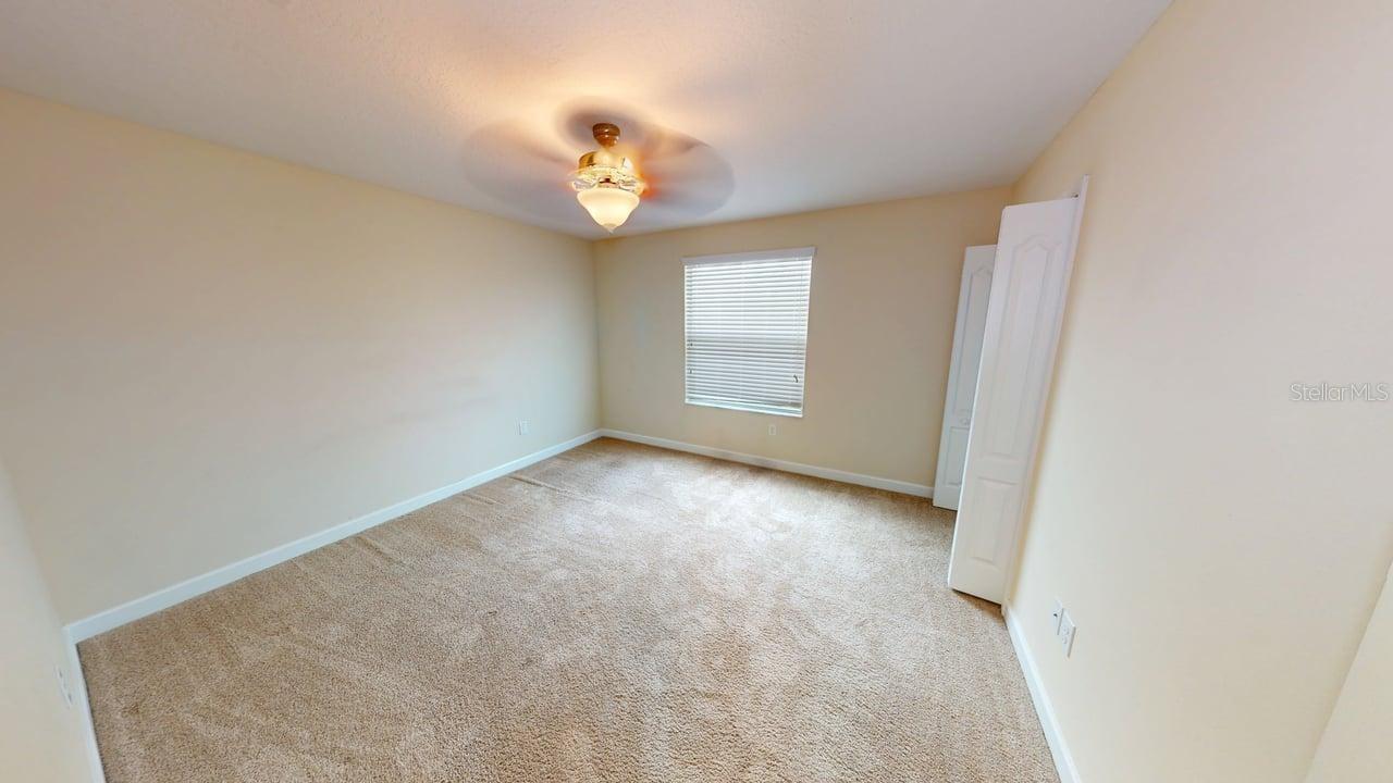 Bedroom 3 located in the back of the home on the left side from the door