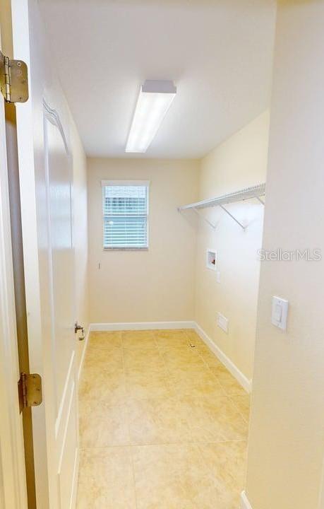 Laundry room located upstairs