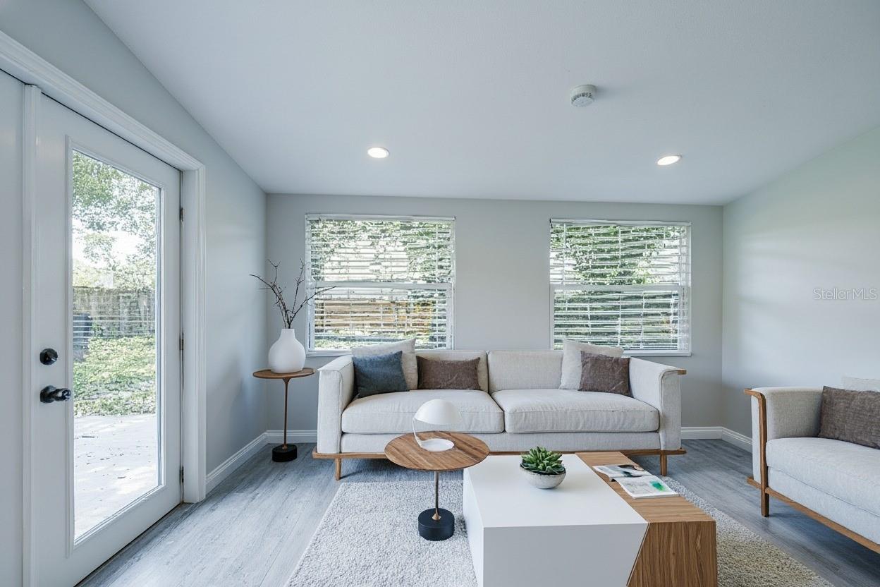 Sunroom leading out onto the back patio area