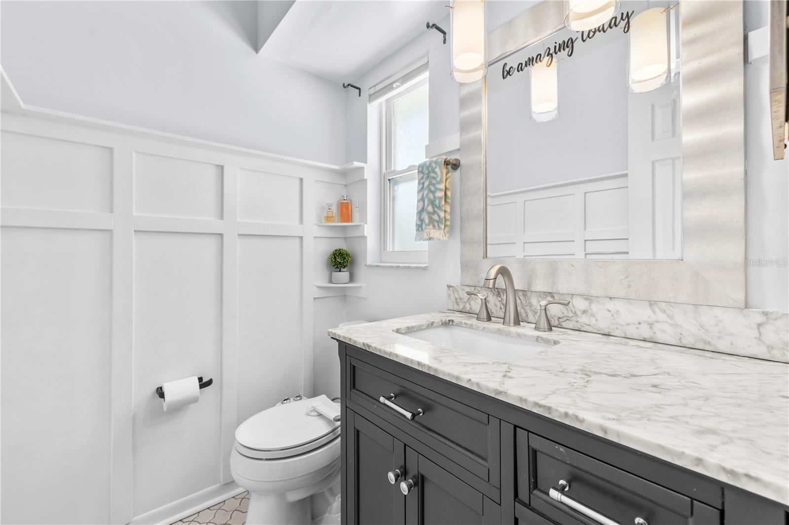 Furnished photos taken of primary bathroom before the property was vacant. Furniture and decorations do not convey.