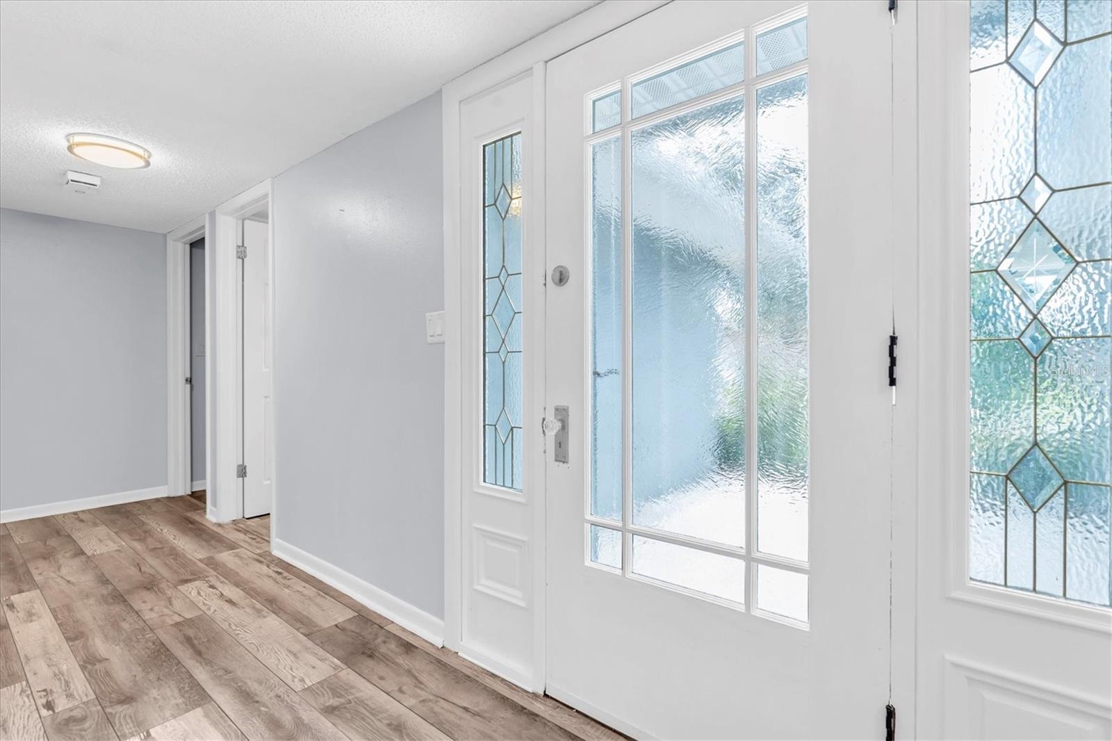 Unfurnished views of foyer provided to showcase space and support your own decorating ideas.