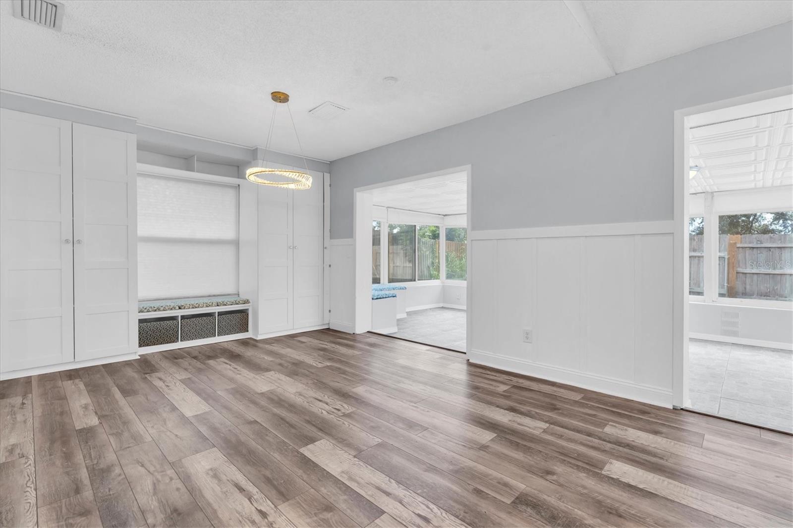 Unfurnished views of dining area and bonus room provided to showcase space and support your own decorating ideas.