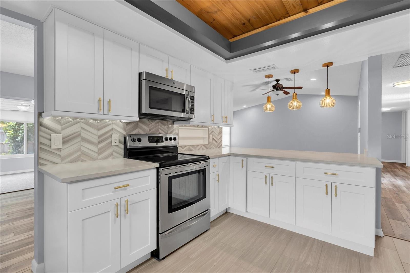 Unfurnished views of kitchen provided to showcase space and support your own decorating ideas.
