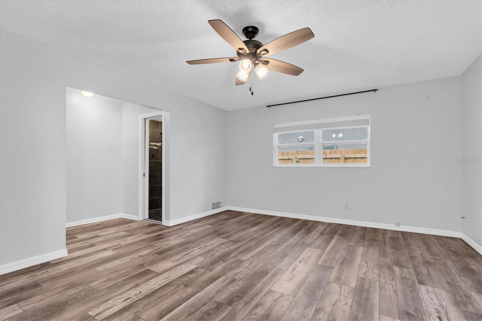 Unfurnished views of primary bedroom provided to showcase space and support your own decorating ideas.