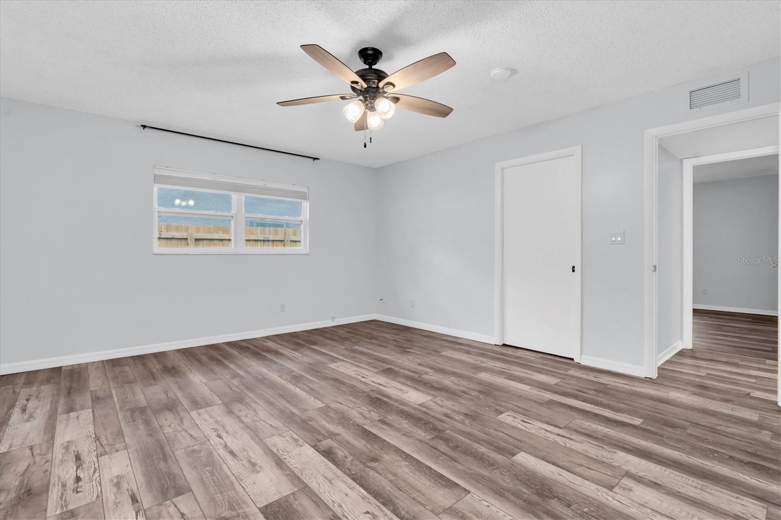 Unfurnished views of primary bedroom provided to showcase space and support your own decorating ideas.