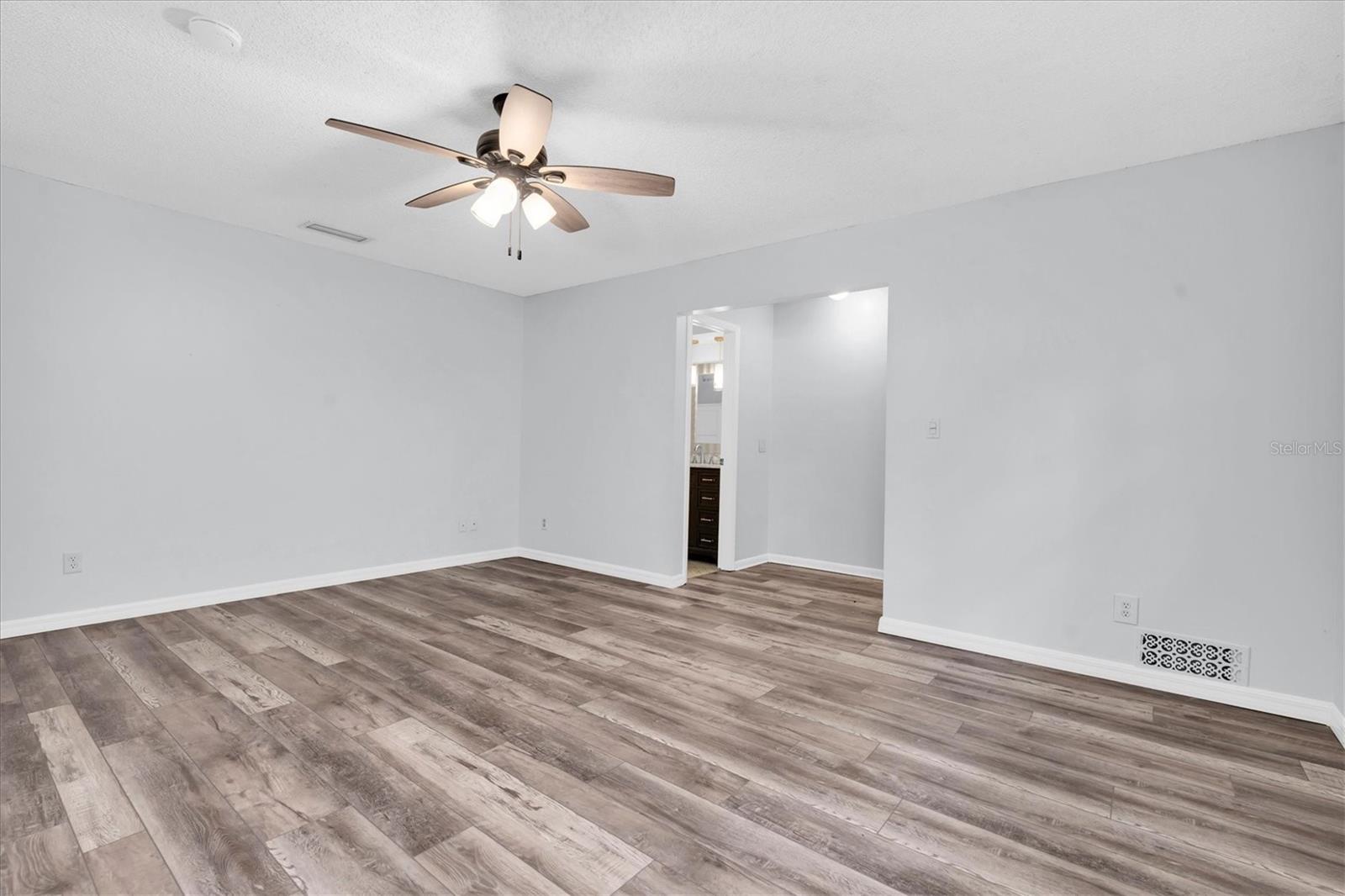 Unfurnished views of primary bedroom provided to showcase space and support your own decorating ideas.
