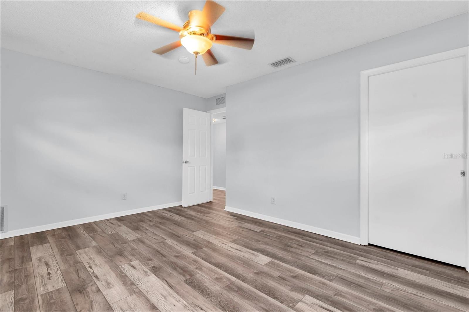 Unfurnished views of bedroom 2 provided to showcase space and support your own decorating ideas.