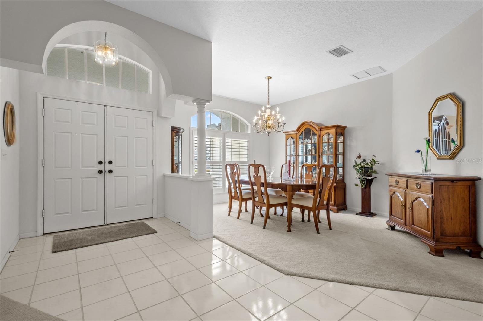 Entry with dining room to immeditate left