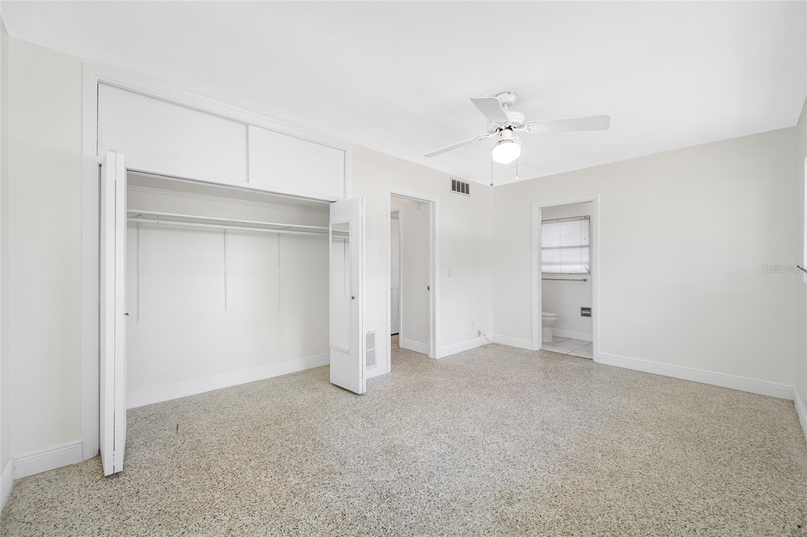 Primary bedroom with full bath