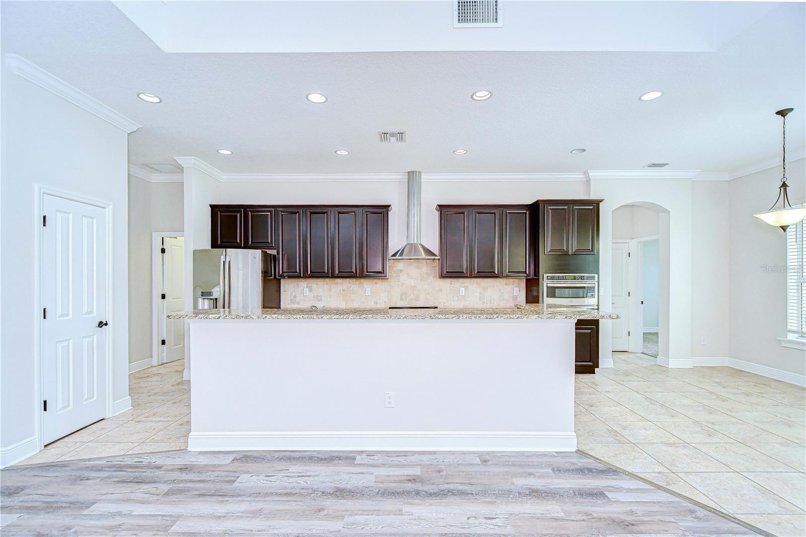 Chef’s kitchen with custom 42” cabinetry and granite counters!