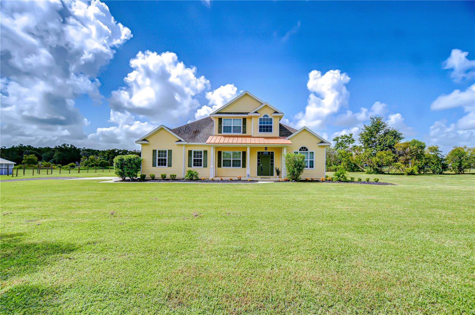Charming front elevation with oversized porch!