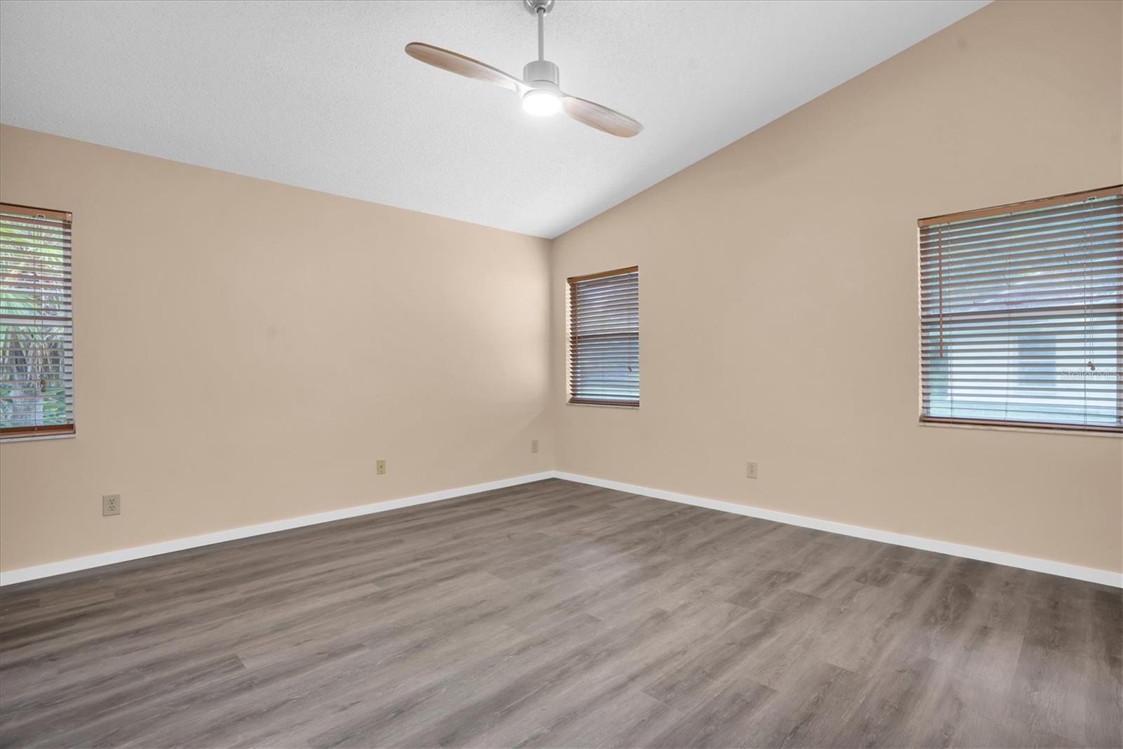 Master bedroom with NEW Luxury Vinyl Plank flooring