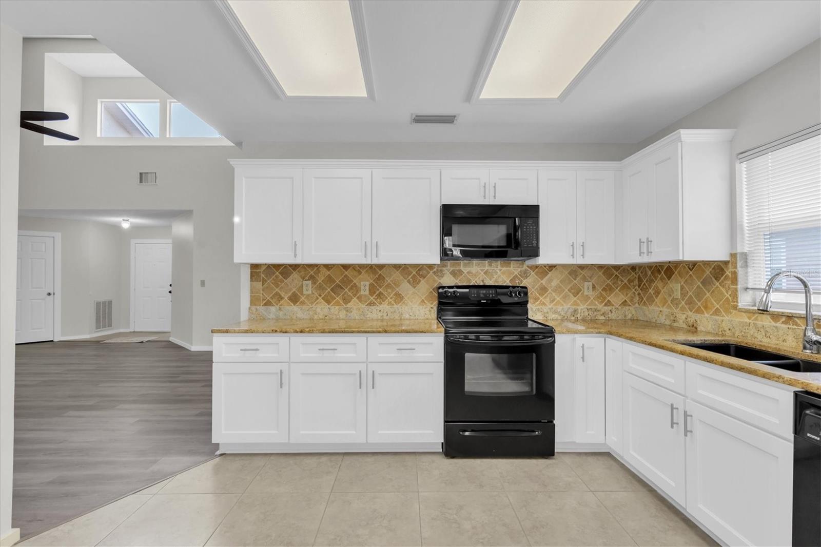 Granite counter tops and tile backsplash