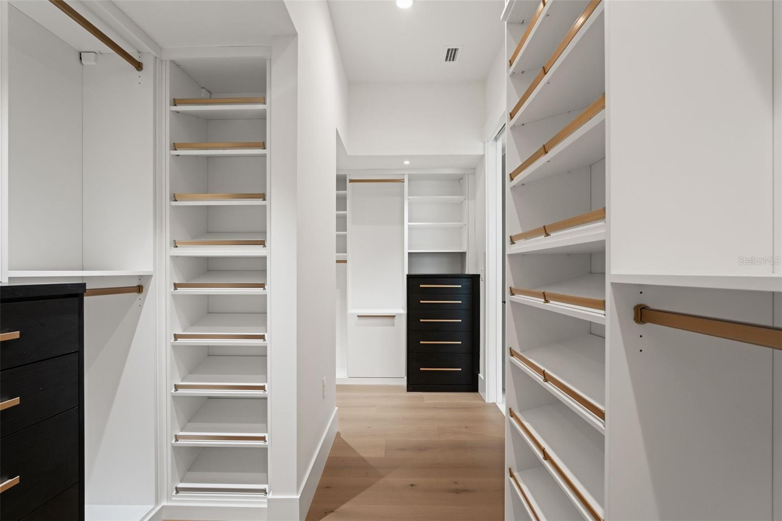 Downstairs primary California Closet