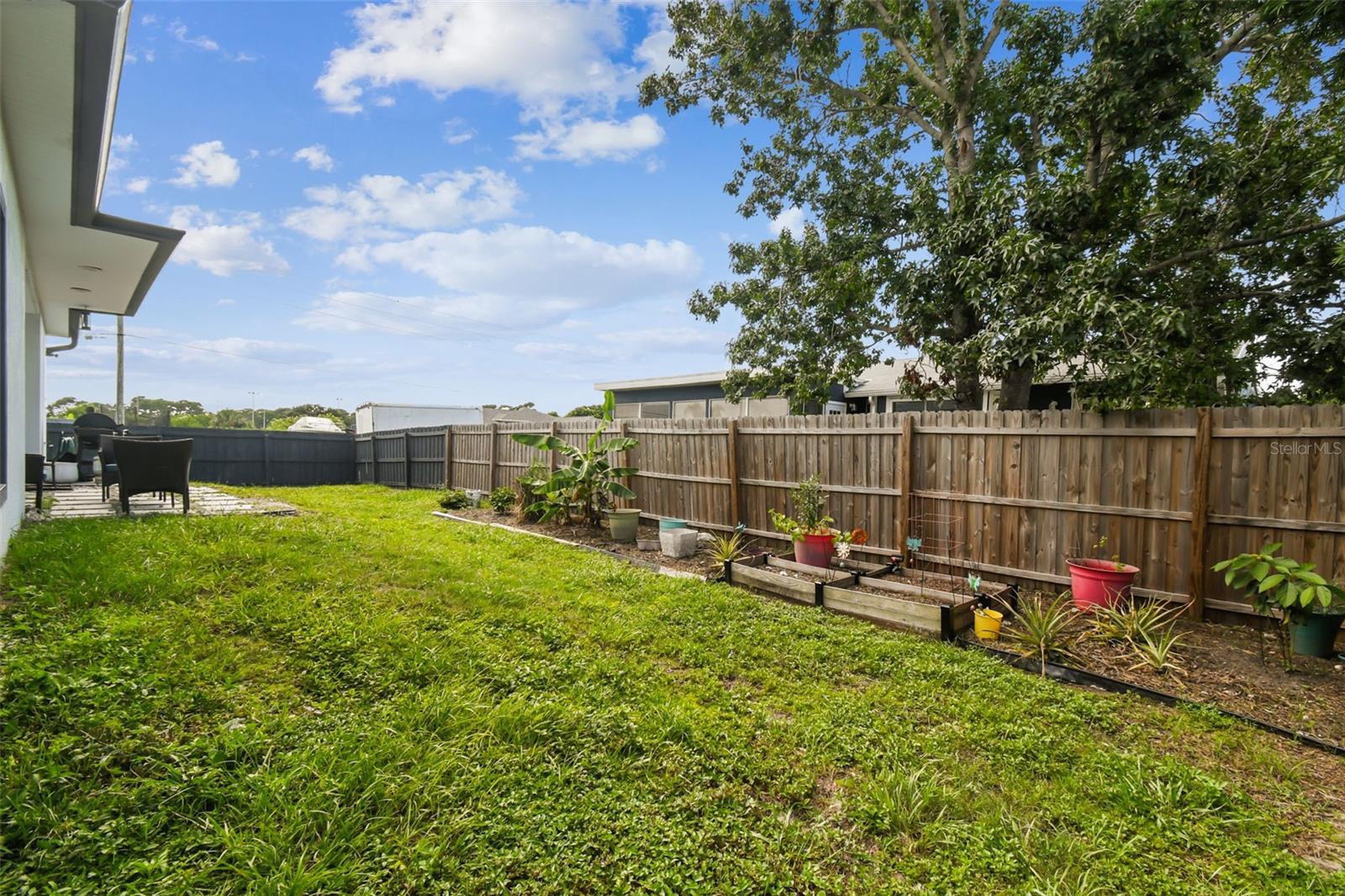 Sweeping fenced in  backyard -  .17 acre corner lot