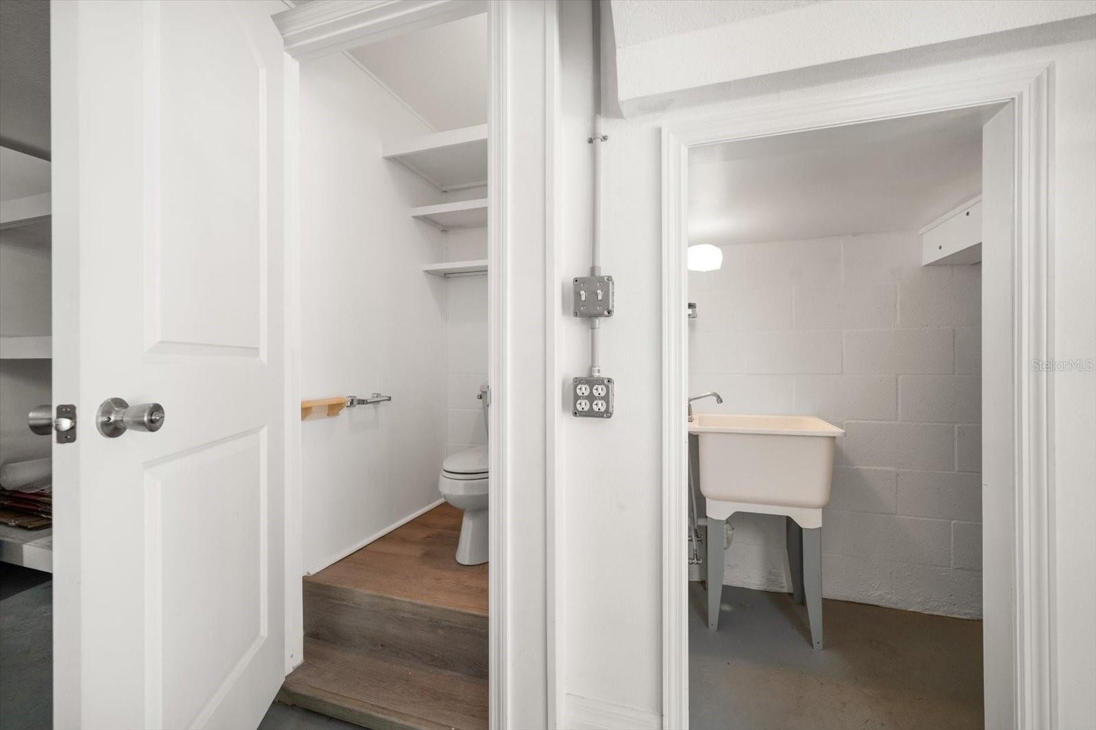 Half bath and workshop in garage