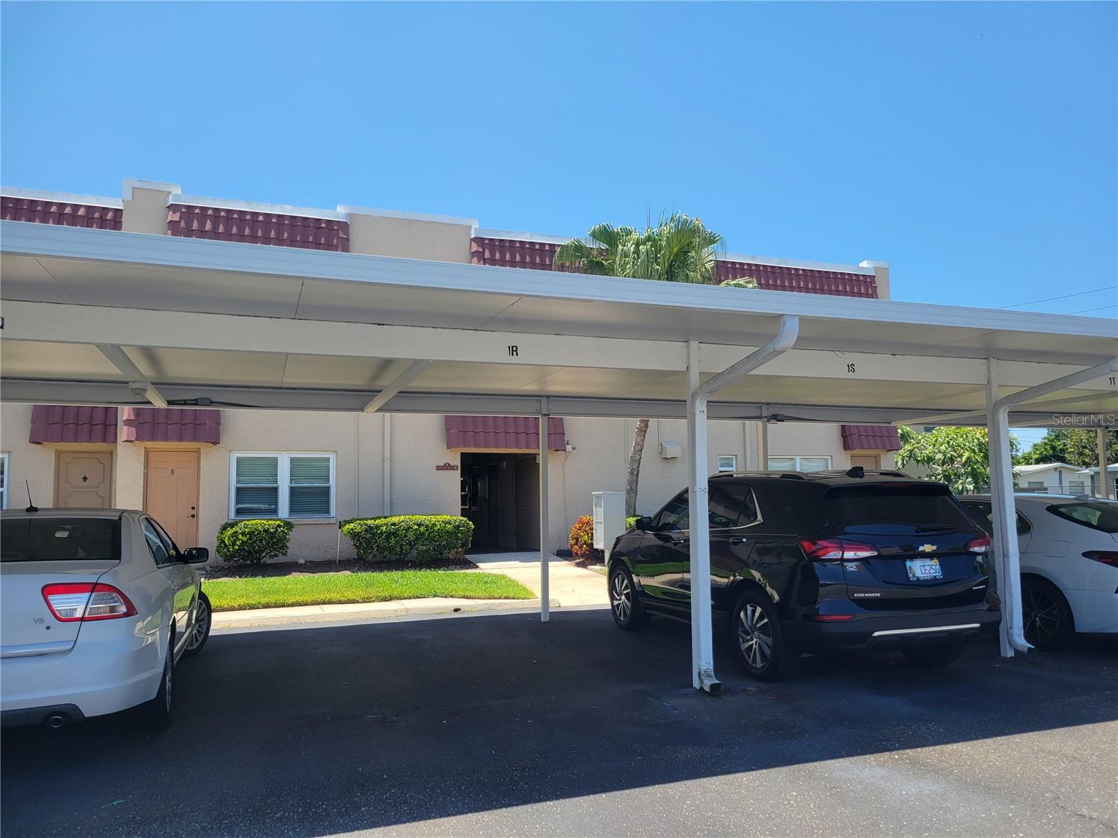 Stair way to unit just a few cars from your carport