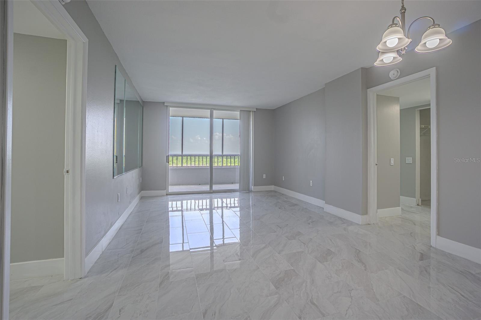 BEAUTIFULLY RENOVATED INTERIOR WITH NEW TILE THROUGHOUT THE UNIT!