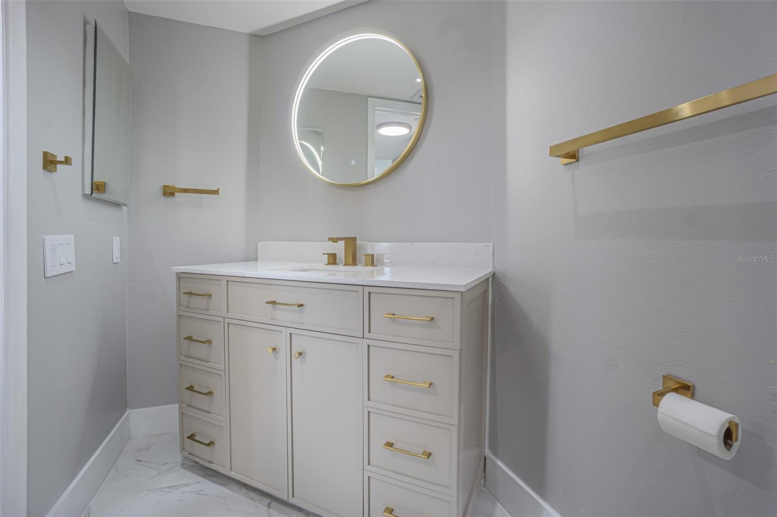 THE MASTER BATHROOM HAS LOTS OF STORAGE